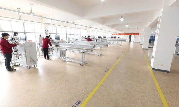 Zhejiang Junquan Automation Co., Ltd. línea de producción del fabricante